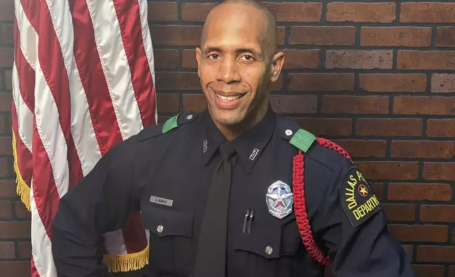 This undated photo provided by the Dallas Police Department shows Officer Darron Burks prior to his graduation from police academy. (Dallas Police Department via AP)