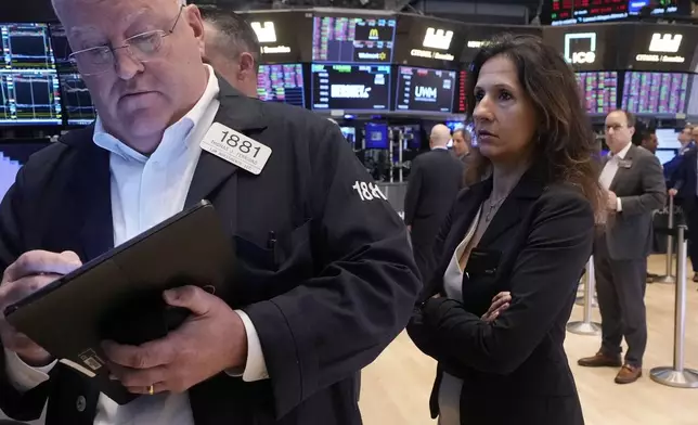 NYSE President Lynn Martin watches trading on the floor of the New York Stock Exchange, Monday, Aug. 5, 2024. Nearly everything on Wall Street is tumbling as fear about a slowing U.S. economy worsens and sets off another sell-off for financial markets around the world. (AP Photo/Richard Drew)