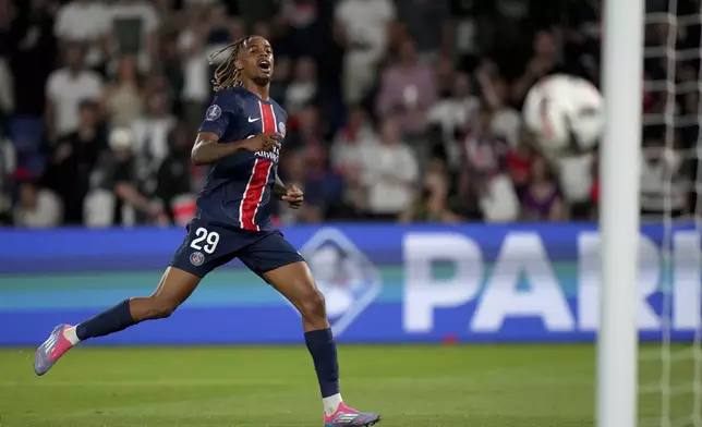 PSG's Bradley Barcola watches a shot go wide of Montpellier's goal during the French League 1 soccer match between Paris Saint-Germain and Montpellier at the Parc des Princes in Paris, Friday, Aug. 23, 2024. (AP Photo/Thibault Camus)