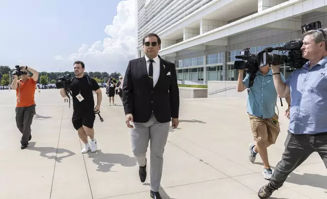 Former U.S. Rep. George Santos arrives at court in Central Islip, N.Y., Monday, Aug. 19, 2024. (AP Photo/Stefan Jeremiah)