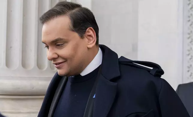 FILE - Rep. George Santos, R-N.Y., leaves the Capitol after being expelled from the House of Representatives, Friday, Dec. 1, 2023, in Washington. (AP Photo/Stephanie Scarbrough)