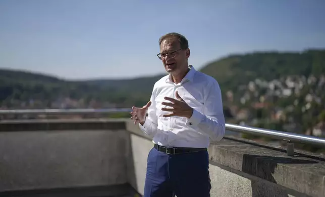 Stefan Traeger, CEO of the Jenoptic, speaks during an interview with The Associated Press at the company's headquarters in Jena, Germany, Monday, Aug. 12, 2024. (AP Photo/Markus Schreiber)