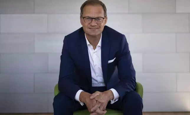 Stefan Traeger, CEO of the Jenoptic, poses for a photo after an interview with The Associated Press at the company's headquarters in Jena, Germany, Monday, Aug. 12, 2024. (AP Photo/Markus Schreiber)