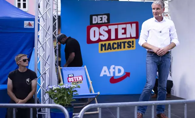 Bjoern Hoecke, top candidate of the far-right Alternative for Germany party, or AfD, speaks on an election campaign rally of the party for upcoming state elections in Suhl, Germany, Tuesday, Aug. 13, 2024. (AP Photo/Markus Schreiber)