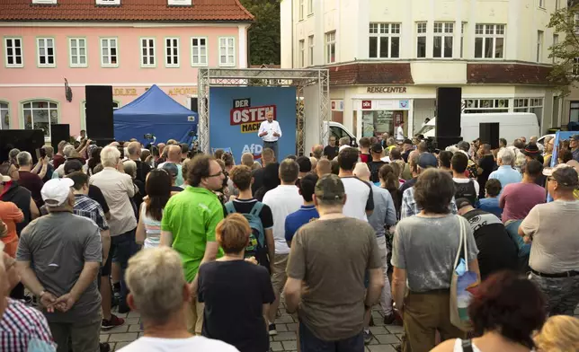 Bjoern Hoecke, top candidate of the far-right Alternative for Germany party, or AfD, speaks on an election campaign rally of the party for upcoming state elections in Suhl, Germany, Tuesday, Aug. 13, 2024. (AP Photo/Markus Schreiber)