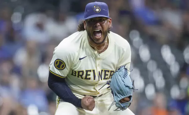 Milwaukee Brewers starting pitcher Willy Peralta reacts after striking out a San Francisco Giants batter to end the sixth inning of a baseball game Wednesday, Aug. 28, 2024, in Milwaukee. (AP Photo/Jeffrey Phelps)