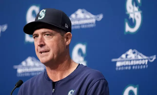 Seattle Mariners manager Dan Wilson speaks during a news conference before a baseball game against the San Francisco Giants, Friday, Aug. 23, 2024, in Seattle. (AP Photo/Lindsey Wasson)