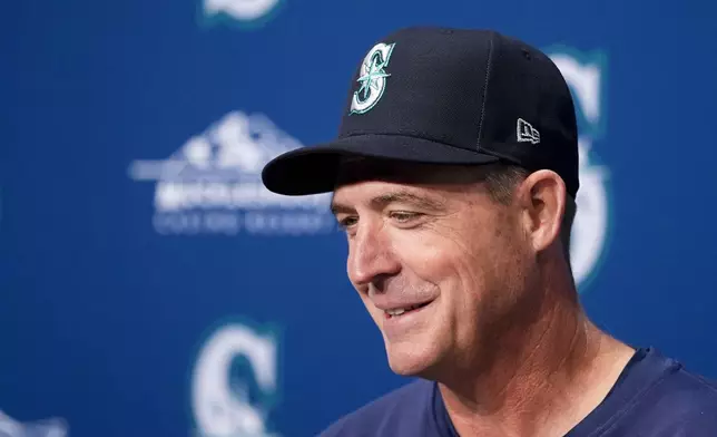 Seattle Mariners manager Dan Wilson speaks during a news conference before a baseball game against the San Francisco Giants, Friday, Aug. 23, 2024, in Seattle. (AP Photo/Lindsey Wasson)