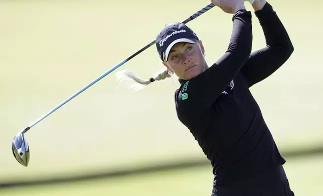 Britain's Charley Hull in action on day two of the 2024 Women's British Open golf championship, at St Andrews, Scotland, Friday Aug. 23, 2024. (Steve Welsh/PA via AP)