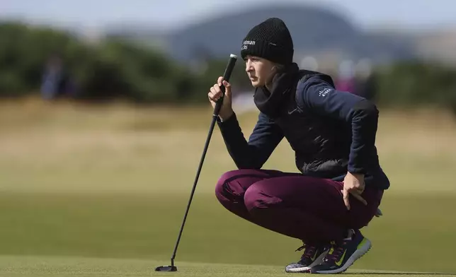 United States' Nelly Korda lines her putt on the 9th green during the second round of the Women's British Open golf championship, in St Andrews, Scotland, Friday, Aug. 23, 2024. (AP Photo/Scott Heppell)