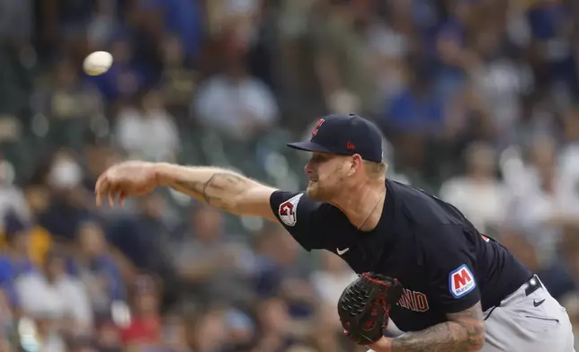 Cleveland Guardians starting pitcher Ben Lively throws to the Milwaukee Brewers during the first inning of a baseball game Sunday, Aug. 18, 2024, in Milwaukee. (AP Photo/Jeffrey Phelps)