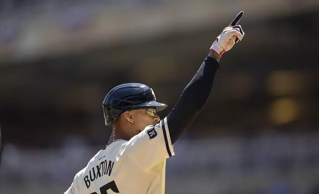 Minnesota Twins' Byron Buxton (25) celebrates his solo home run in the second inning of a baseball game against the Cleveland Guardians in Minneapolis, Minn., Sunday, Aug. 11, 2024. (Elizabeth Flores/Star Tribune via AP)