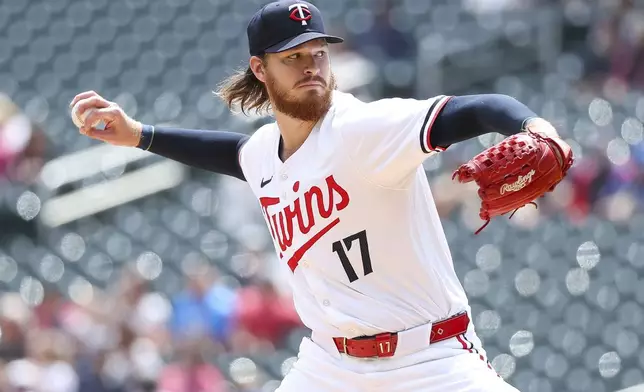 Minnesota Twins starting pitcher Bailey Ober delivers against the Cleveland Guardians during the first inning of the first game of a baseball doubleheader, Friday, Aug. 9, 2024, in Minneapolis. (AP Photo/Matt Krohn)