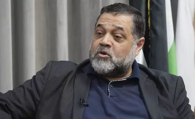 Hamas political official Osama Hamdan speaks during an interview with The Associated Press in Doha, Qatar, Tuesday Aug. 13, 2024. (AP Photo/Malak Harb)