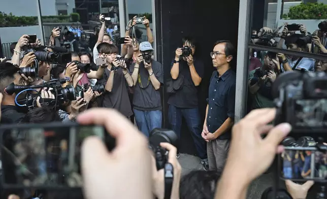 Chung Pui-kuen, the former chief editor of Hong Kong's now-shuttered outlet Stand News, walks outside on bail after he was found guilty in a landmark sedition trial under a colonial-era law, in Wanchai District Court in Hong Kong on Thursday, Aug. 29, 2024. (AP Photo/Billy H.C. Kwok)