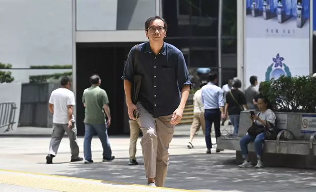 Chung Pui-kuen, the former chief editor of Hong Kong's now shuttered pro-democracy news outlet Stand News, arrivies at the Wanchai District Court ahead of a verdict in a landmark sedition trial in Hong Kong on Thursday, Aug. 29, 2024. (AP Photo/Billy H.C. Kwok)