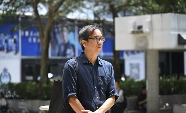 Chung Pui-kuen, the former chief editor of Hong Kong's now shuttered pro-democracy news outlet Stand News, arrivies at the Wanchai District Court ahead of a verdict in a landmark sedition trial in Hong Kong on Thursday, Aug. 29, 2024. (AP Photo/Billy H.C. Kwok)