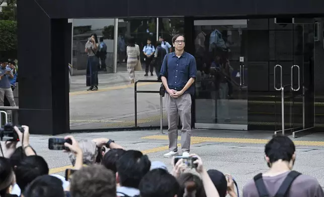 Chung Pui-kuen, the former chief editor of Hong Kong's now-shuttered outlet Stand News, walks outside on bail after he was found guilty in a landmark sedition trial under a colonial-era law, in Wanchai District Court in Hong Kong on Thursday, Aug. 29, 2024. (AP Photo/Billy H.C. Kwok)