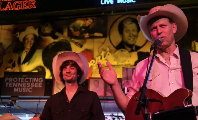 Musicians perform at Nashville’s Robert’s Western World honky tonk after the Sunday Gospel Hour on Sunday, July 28, 2024, in Nashville, Tenn. (AP Photo/Luis Andres Henao)