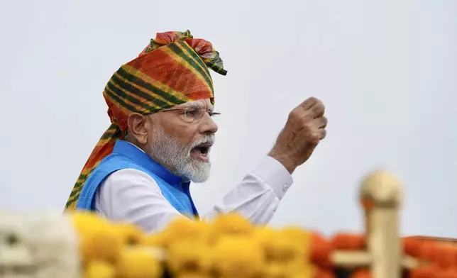 Indian Prime Minister Narendra Modi addresses the nation from the 17th century Mughal-era Red Fort monument during the country's Independence Day celebrations in New Delhi, India, Thursday, Aug. 15, 2024. (AP Photo/Manish Swarup)