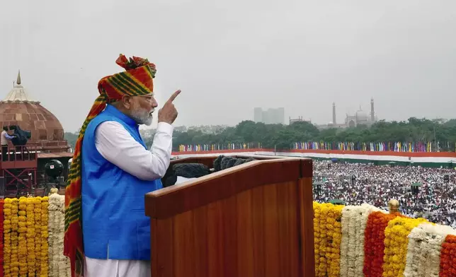 Indian Prime Minister Narendra Modi addresses the nation from the 17th century Mughal-era Red Fort monument during the country's Independence Day celebrations in New Delhi, India, Thursday, Aug. 15, 2024. (AP Photo/Manish Swarup)