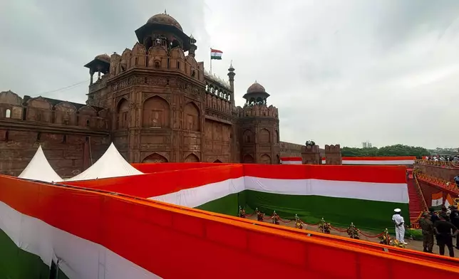 The front compound of the 17th century Mughal-era Red Fort monument is decorated in India's national colors for the country's Independence Day celebrations in New Delhi, India, Thursday, Aug. 15, 2024. (AP Photo/Manish Swarup)