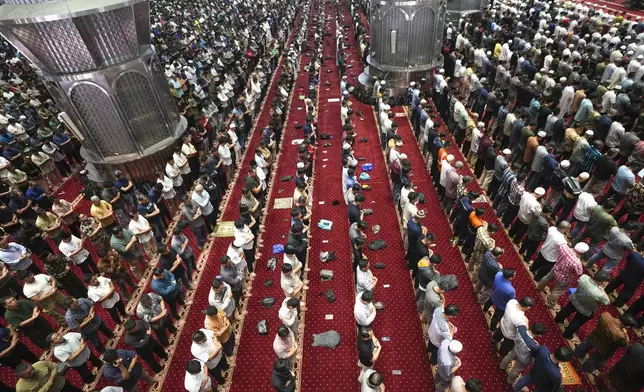 Muslim men perform Friday prayer at Istiqlal Mosque in Jakarta, Indonesia, Friday, Aug. 9, 2024. (AP Photo/Tatan Syuflana)