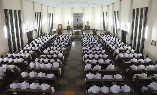 Seminarians attend morning Mass at Ritapiret Major Seminary in Maumere, East NusaTenggara province, Indonesia, Friday, Aug. 23, 2024. (AP Photo/Tatan Syuflana)