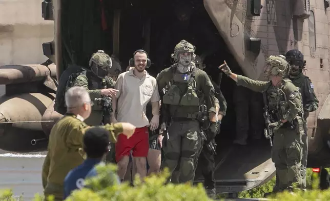 FILE - Freed hostage Andrey Kozlov, 27, arrives by helicopter to the Sheba Medical Center in Ramat Gan, Israel, June 8, 2024. (AP Photo/Tomer Appelbaum, File)