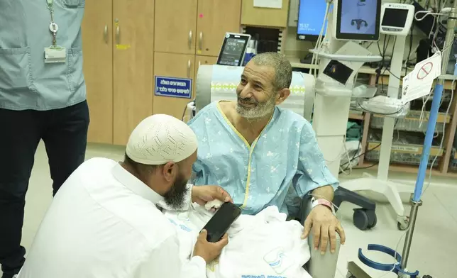 In this photo released by the Israel Prime Minister Office on Tuesday, Aug. 27, 2024, Kaid Farhan Al-Qadi, 52, who was held hostage by Hamas militants in Gaza sits in a room at the Soroka Medical Center in Beersheba, Israel. (Israel Prime Minister Office via AP)