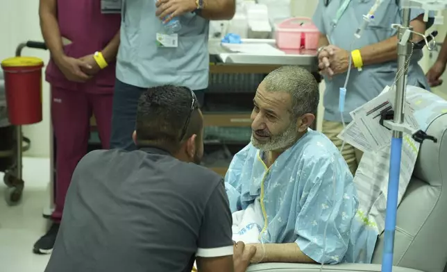 In this photo released by the Israel Prime Minister Office on Tuesday, Aug. 27, 2024, Kaid Farhan Al-Qadi, 52, who was held hostage by Hamas militants in Gaza sits in a room at the Soroka Medical Center in Beersheba, Israel. (Israel Prime Minister Office via AP)