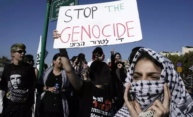 Palestinian citizens of Israel march in support of Palestinians in the Gaza Strip and those held in Israeli jails, in Umm Al-Fahm, Israel, Saturday, Aug. 3, 2024. (AP Photo/Mahmoud Illean)