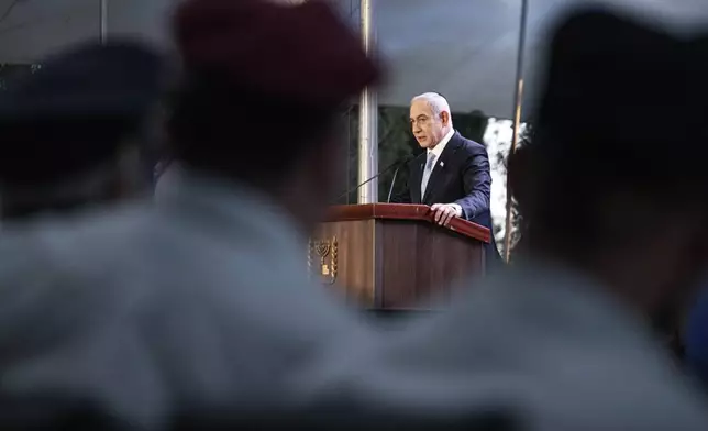 Israeli Prime Minister Benjamin Netanyahu speaks at the state memorial for Ze'ev Jabotinsky, at Mount Herzl Military Cemetery in Jerusalem, Sunday, Aug. 4, 2024. (Naama Grynbaum/Pool Photo via AP)