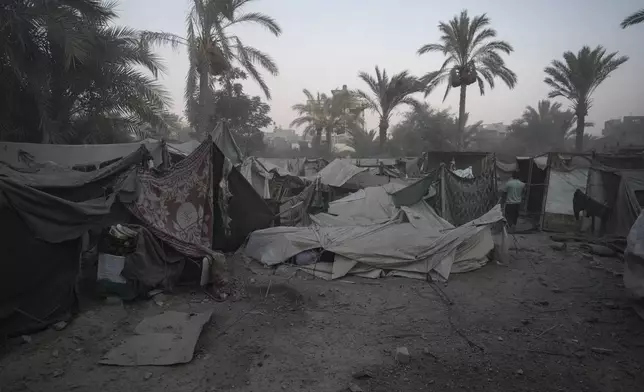 Tents are in disarray after an Israeli airstrike in Deir al Balah, Gaza Strip, Tuesday, Aug. 6, 2024. (AP Photo/Abdel Kareem Hana)