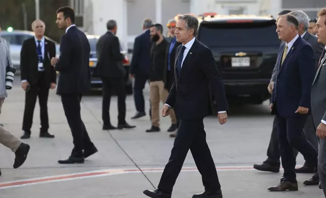 U.S. Secretary of State Antony Blinken walks after his arrival in Tel Aviv, Israel, Sunday, Aug. 18, 2024. (Kevin Mohatt/Pool Photo via AP)