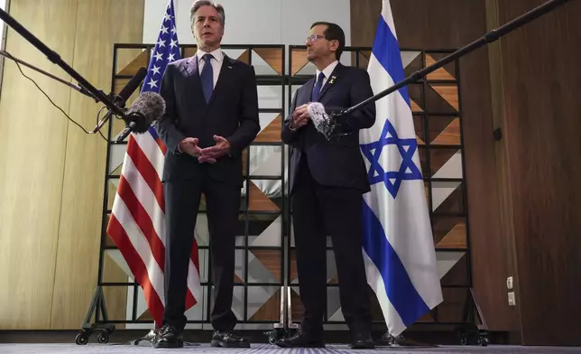 U.S. Secretary of State Antony Blinken, left, meets with Israel's President Isaac Herzog, in Tel Aviv, Israel, Monday, Aug. 19, 2024. (Kevin Mohatt/Pool Photo via AP)