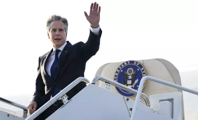 FILE - Secretary of State Antony Blinken waves as he boards his plane to depart Yokota Air Base in Fussa, on the outskirts of Tokyo, July 29, 2024. (AP Photo/Shuji Kajiyama, Pool, File)