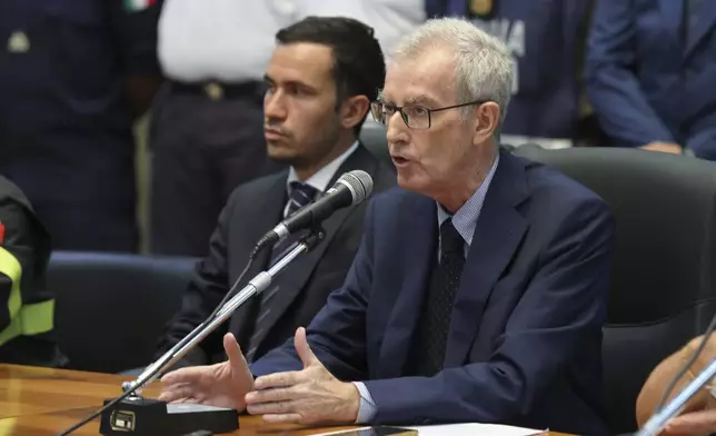 Italian Prosecutor Ambrogio Cartosio, right, attends a press conference on the shipwreck of the Bayesian in Termini Imerese, Sicily, Aug. 24, 2024. (Raffaele Macauda/LaPresse via AP)