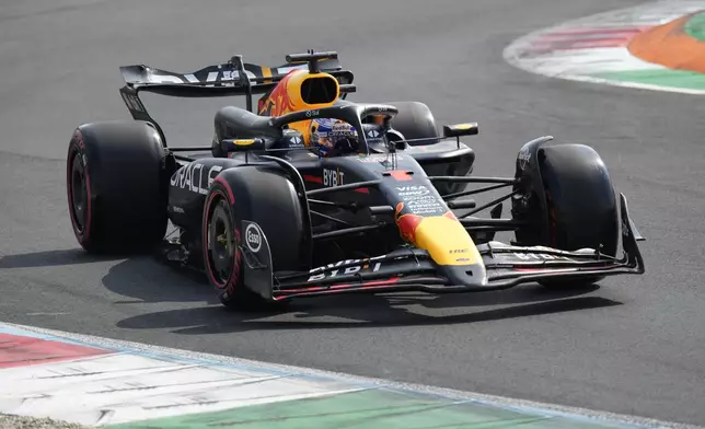 Red Bull driver Max Verstappen of the Netherlands steers his car during qualifying session ahead of the Formula One Italian Grand Prix race at the Monza racetrack, in Monza, Italy, Saturday, Aug. 31, 2024. (AP Photo/Luca Bruno)