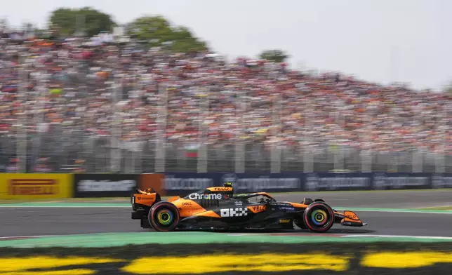 McLaren driver Lando Norris of Britain steers his car during qualifying session ahead of the Formula One Italian Grand Prix race at the Monza racetrack, in Monza, Italy, Saturday, Aug. 31, 2024. (AP Photo/Luca Bruno)