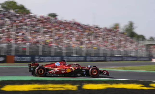 Ferrari driver Charles Leclerc of Monaco steers his car during qualifying session ahead of the Formula One Italian Grand Prix race at the Monza racetrack, in Monza, Italy, Saturday, Aug. 31, 2024. (AP Photo/Luca Bruno)