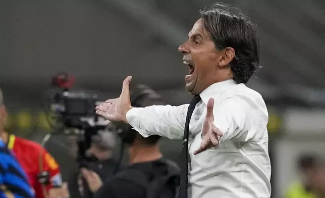 Inter Milan's head coach Simone Inzaghi reacts during a Serie A soccer match between Inter Milan and Lecce, at the San Siro stadium in Milan, Italy, Saturday, Aug. 24, 2024. (AP Photo/Luca Bruno)