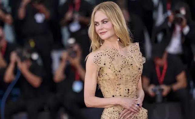 Nicole Kidman poses for photographers upon arrival for the premiere of the film 'Babygirl' during the 81st edition of the Venice Film Festival in Venice, Italy, on Friday, Aug. 30, 2024. (Photo by Vianney Le Caer/Invision/AP)