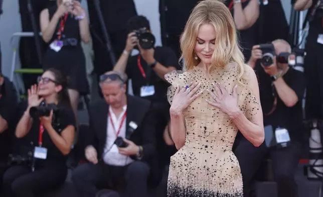 Nicole Kidman poses for photographers upon arrival for the premiere of the film 'Babygirl' during the 81st edition of the Venice Film Festival in Venice, Italy, on Friday, Aug. 30, 2024. (Photo by Vianney Le Caer/Invision/AP)