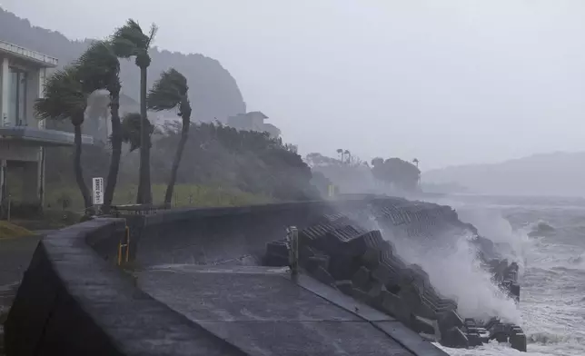 High waves hit a coastal area in Ibusuki, Kagoshima prefecture, western Japan, Wednesday, Aug. 28, 2024, as a typhoon is approaching. (Hidetaka Komukai/Kyodo News via AP)