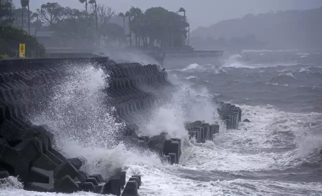 High waves hit a coastal area in Ibusuki, Kagoshima prefecture, western Japan, Wednesday, Aug. 28, 2024, as a typhoon is approaching. (Hidetaka Komukai/Kyodo News via AP)