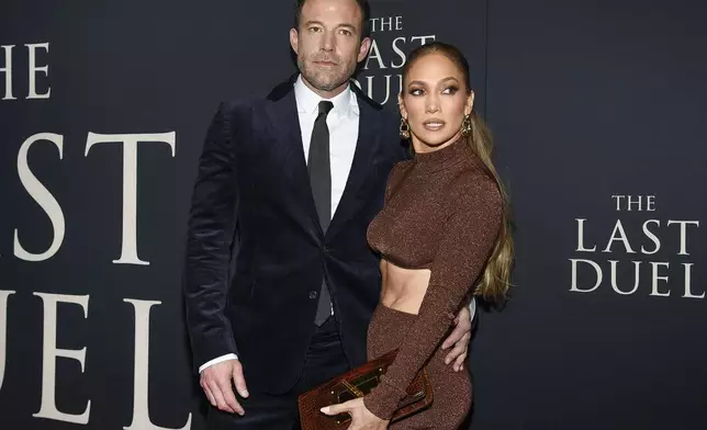 FILE - Actor Ben Affleck, left, and actor-singer Jennifer Lopez attend the premiere of "The Last Duel" on Oct. 9, 2021, in New York. (Photo by Evan Agostini/Invision/AP, File)