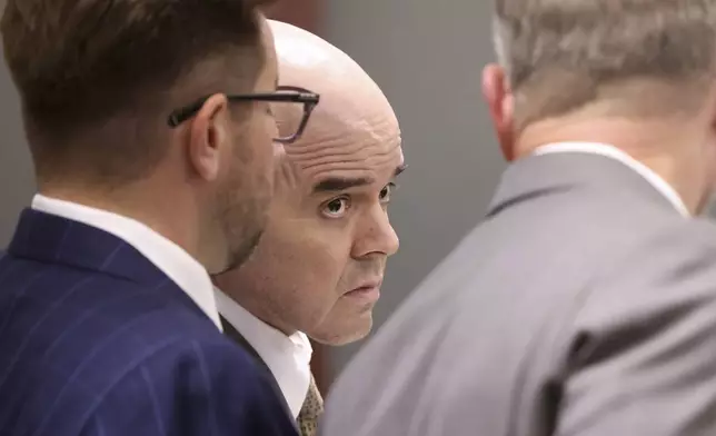 Robert Telles, center, listens in court with his attorneys Robert Draskovich, right, and Michael Horvath, prior to jury selection on the second day of his murder trial at the Regional Justice Center in Las Vegas Tuesday, Aug. 13, 2024. Telles, a former Clark County public administrator, is charged in the murder of Las Vegas Review-Journal investigative journalist Jeff German. (K.M. Cannon/Las Vegas Review-Journal via AP, Pool)