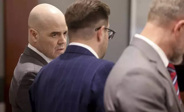 Robert Telles, left, listens in court with his attorneys Robert Draskovich, right, and Michael Horvath, prior to jury selection on the second day of his murder trial at the Regional Justice Center in Las Vegas Tuesday, Aug. 13, 2024. Telles, a former Clark County public administrator, is charged in the murder of Las Vegas Review-Journal investigative journalist Jeff German. (K.M. Cannon/Las Vegas Review-Journal via AP, Pool)