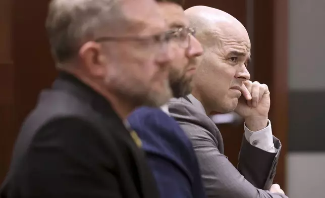 Robert Telles, right, a former Clark County public administrator charged in the murder of Las Vegas Review-Journal investigative journalist Jeff German, listens to closing arguments during his murder trial at the Regional Justice Center in Las Vegas, Monday, Aug. 26, 2024. With Telles are his attorneys Robert Draskovich, left, and Michael Horvath. (K.M. Cannon/Las Vegas Review-Journal via AP, Pool)